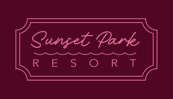 Neon sign for Sunset Park Resort on a dark background
